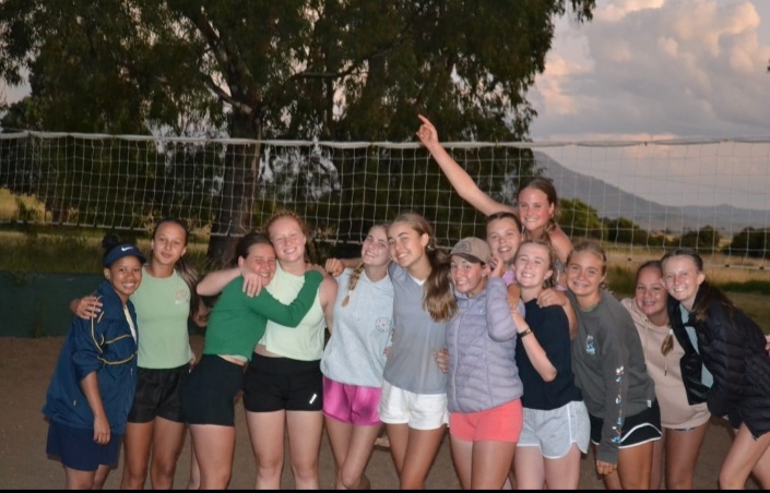 A team of learners together after a group activity